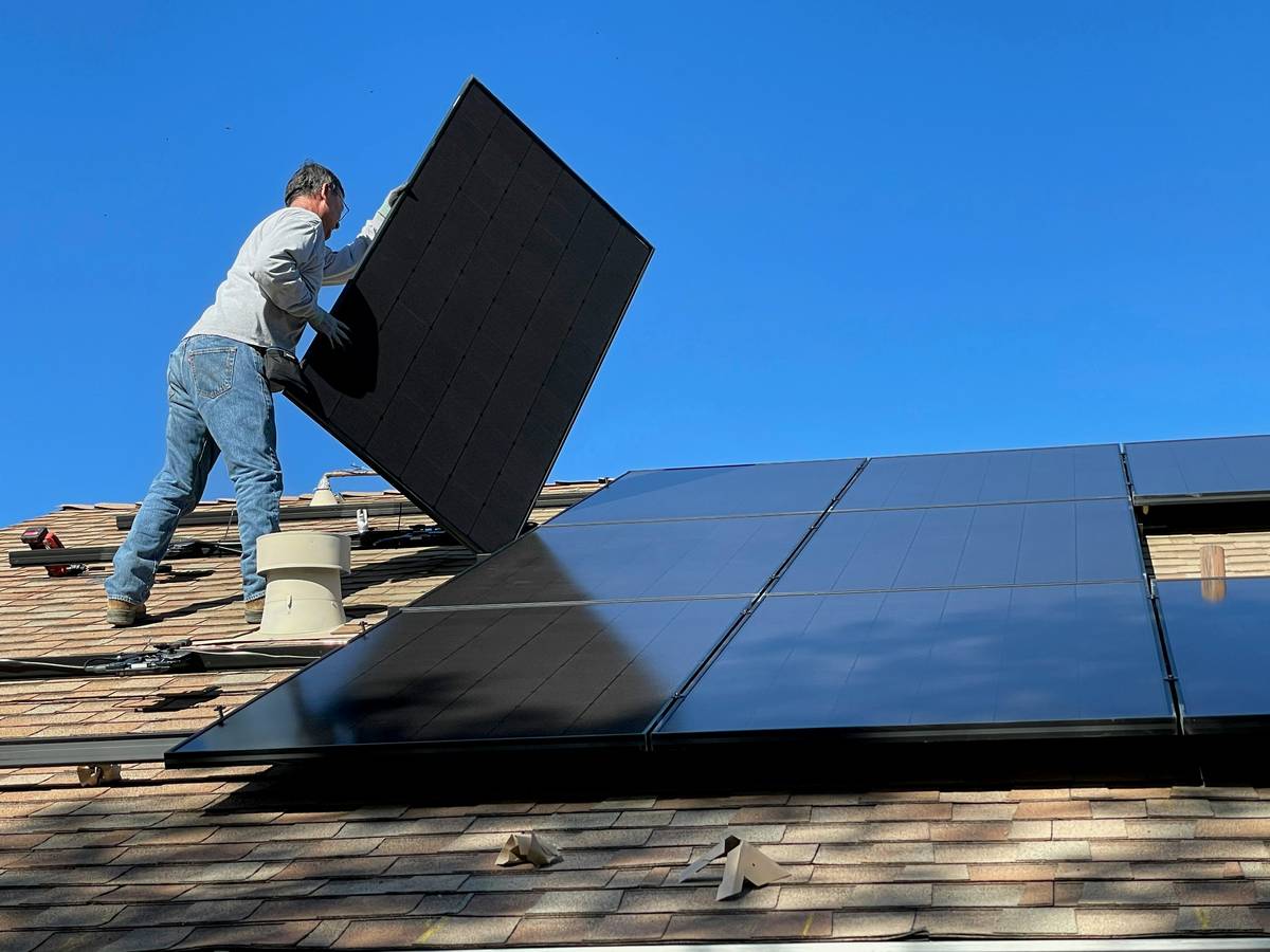 Chart showing growth trends in solar energy stocks alongside residential solar adoption rates